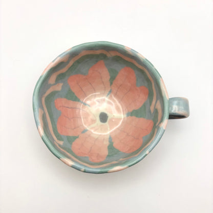 Handmade Sakura Nerikomi porcelain mug with a pink and white marbled cherry blossom pattern, 9-10 oz capacity with a comfortable hand-pinched handle.
