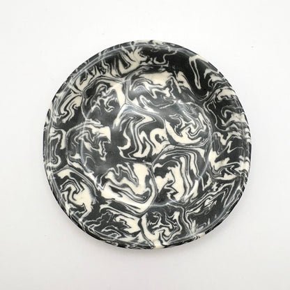 Handmade Ink Storm Nerikomi porcelain plate saucer featuring high-contrast black and white marbled patterns and a glossy clear glaze.