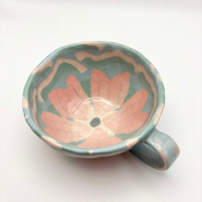 Handmade Sakura Nerikomi porcelain mug with a pink and white marbled cherry blossom pattern, 9-10 oz capacity with a comfortable hand-pinched handle.