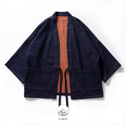 Reversible unisex Haori jacket by Ellie Studio, featuring contrasting indigo and burnt orange sides for a versatile, two-in-one look. front view