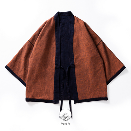 Reversible unisex Haori jacket by Ellie Studio, featuring contrasting indigo and burnt orange sides for a versatile, two-in-one look. reverse side