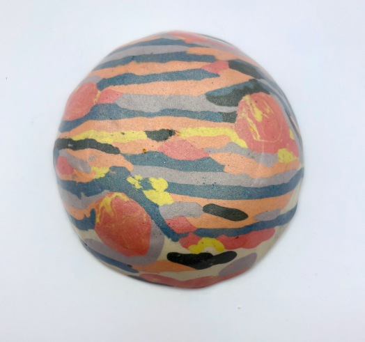 Handmade patterned ceramic plates created by students in a Nerikomi workshop. galaxy planet abstract art