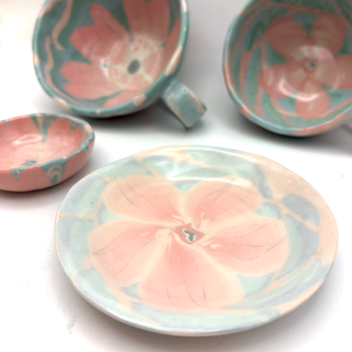 Sakura collection pink and white marbled porcelain bowl mug plate sau cer plate handcrafted using the Japanese Nerikomi technique.