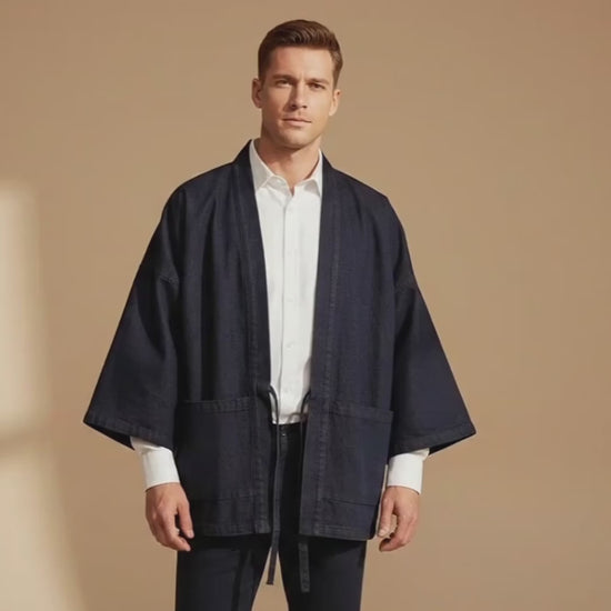 Reversible unisex Haori jacket by Ellie Studio, featuring contrasting indigo and burnt orange sides for a versatile, two-in-one look. video demo